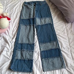 patched fringed straight leg jeans